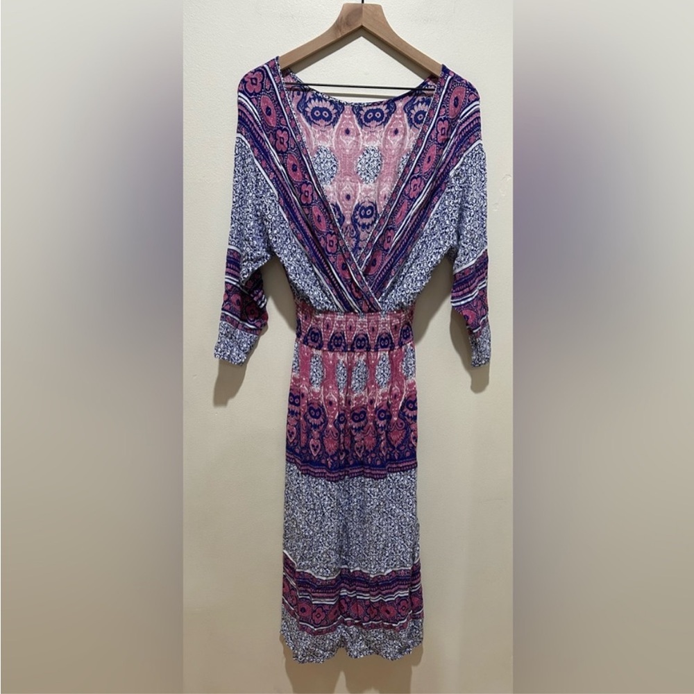 Free People Purple and White Boho Wrap Midi Dress. Photo is example of wear